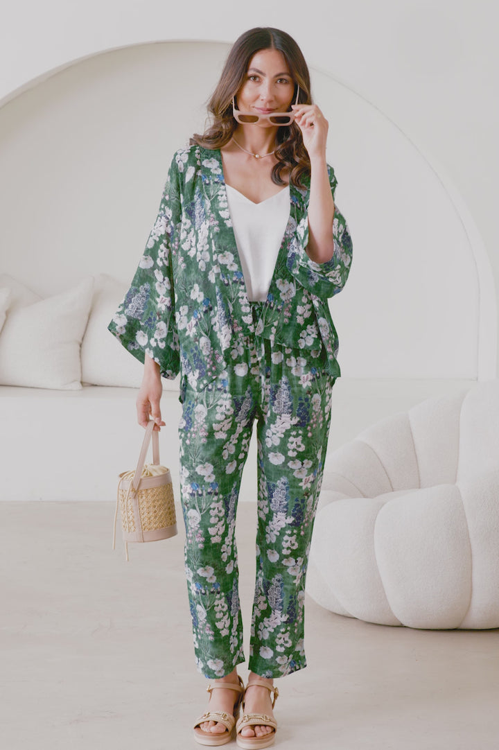 Lissy Floral Print Tapered Pants in Olive product video by Carolina