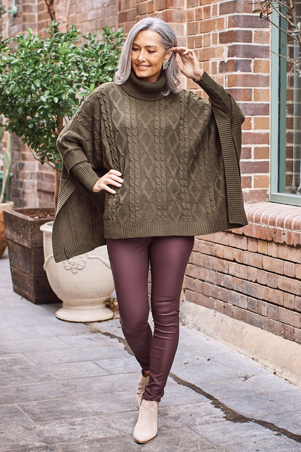 olive poncho outfit
